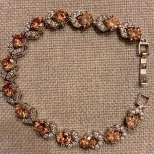 Stunning Silver-Toned Bracelet with Peach Colored Stones - 7”